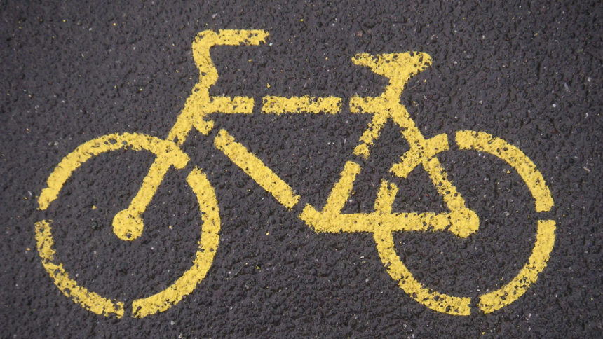 yellow bicycle painted on road, bike path.jpg_38399974_ver1.0_1280_720