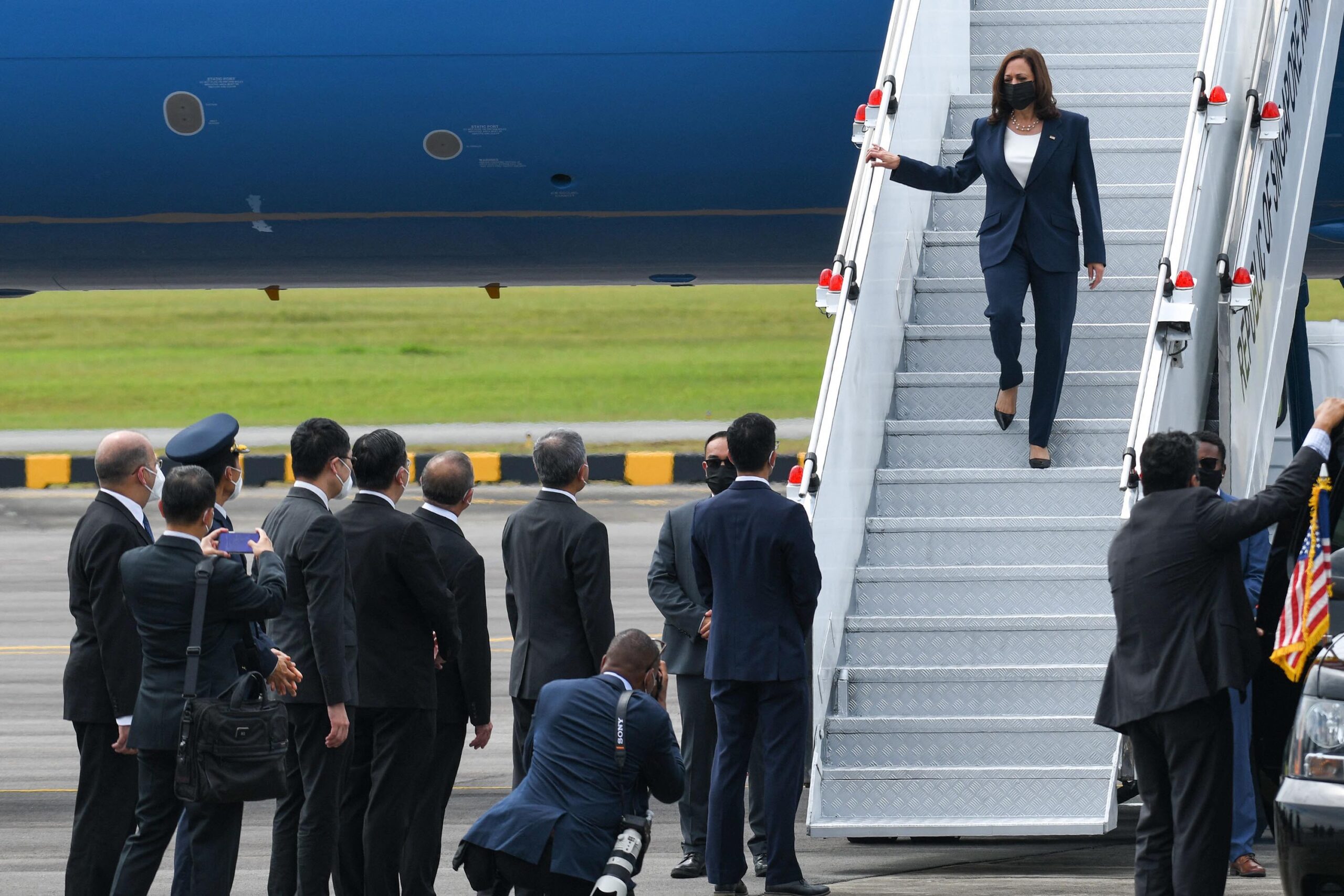 Vice President Kamala Harris' departure for Vietnam was delayed Tuesday afternoon after her office was informed of a "report of a recent possible anomalous health incident" in Hanoi. Harris here arrives in Singapore on August 22.